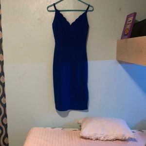 Dark blue/royal blue Size small in good condition